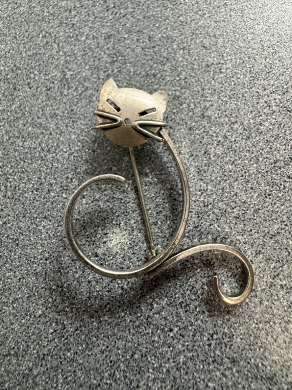 Modernist cat brooch.